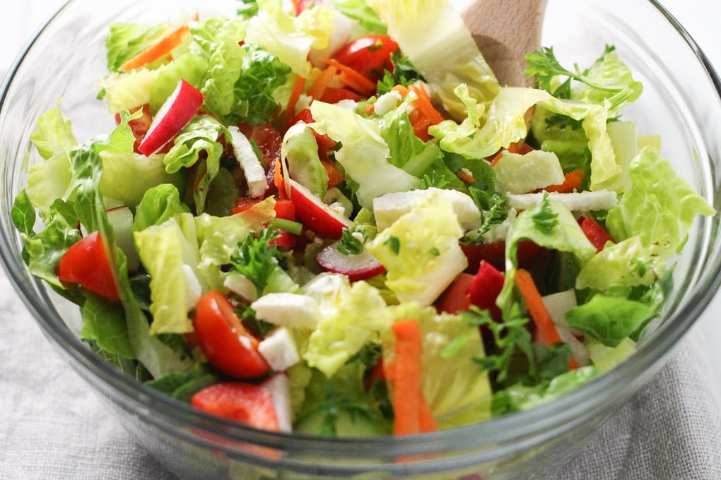 Romaine salad in a glass bowl.