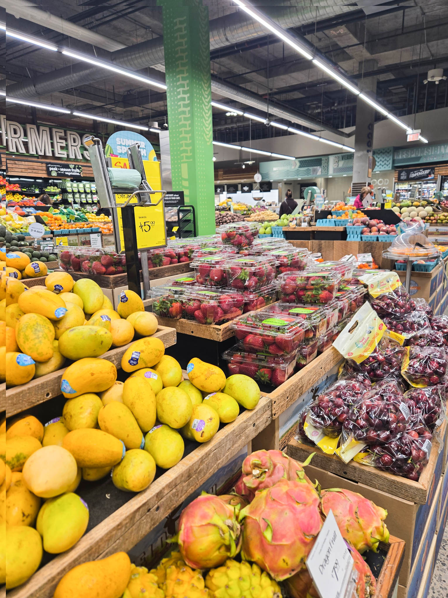 Various fruits in a grocery store.