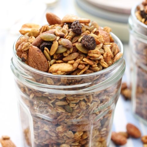 Homemade sugar free granola in a glass jar.