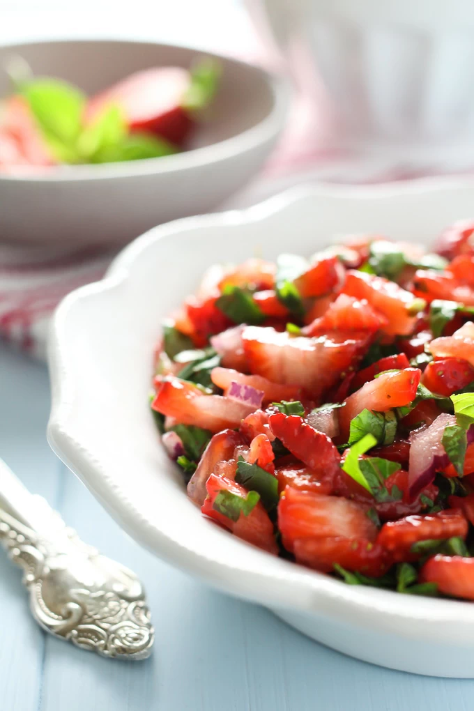 Strawberry salsa on a white plate.