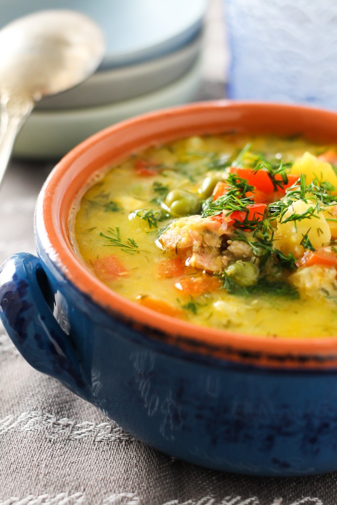 Salmon Corn Chowder with Coconut Milk in a blue bowl.