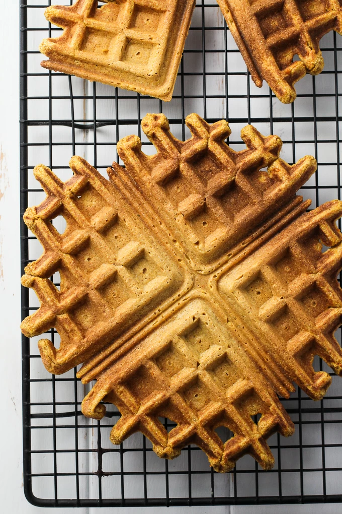 Top view of Healthy Sweet Potato Waffles on a cooling rack.