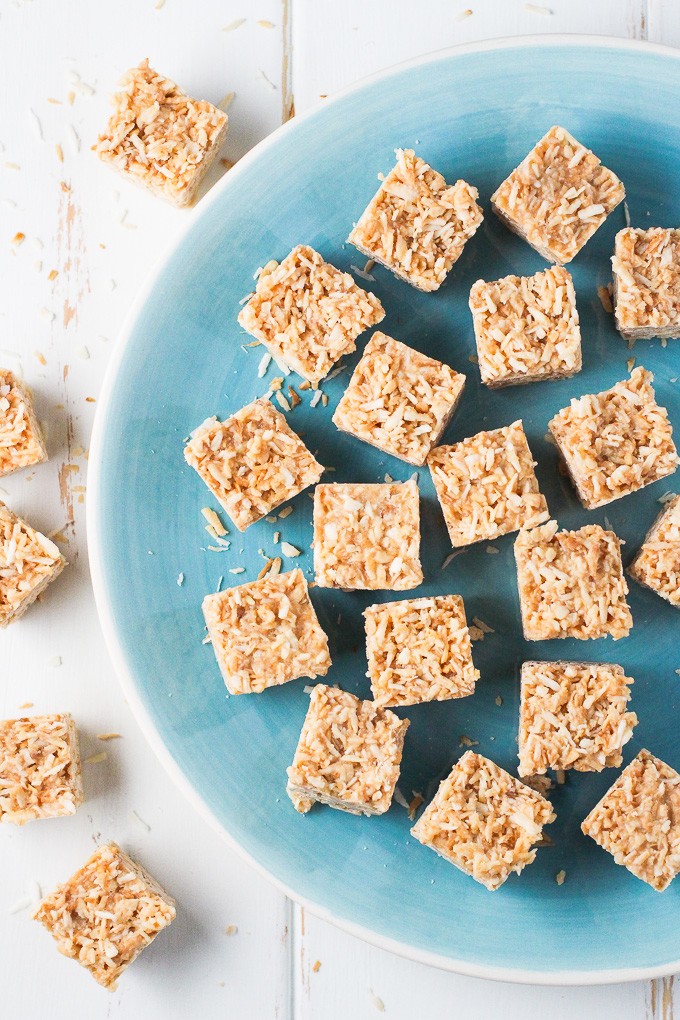 Toasted Coconut Bites on a blue plate. Top view.