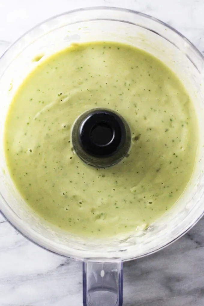 Pureed avocado soup in a blender. Top view.