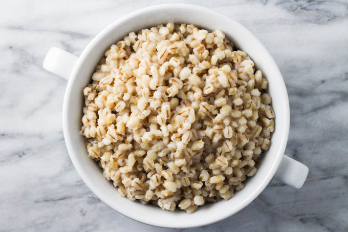 Cooked barley in a bowl.