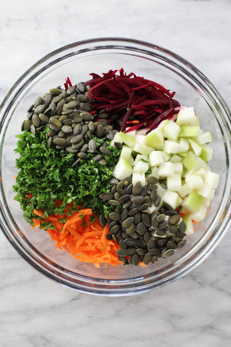 All salad ingredients in a salad bowl.