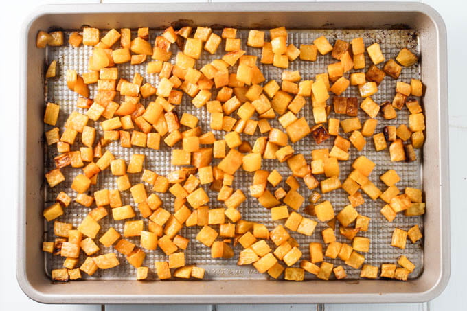 Roasted rutabaga on a baking dish.