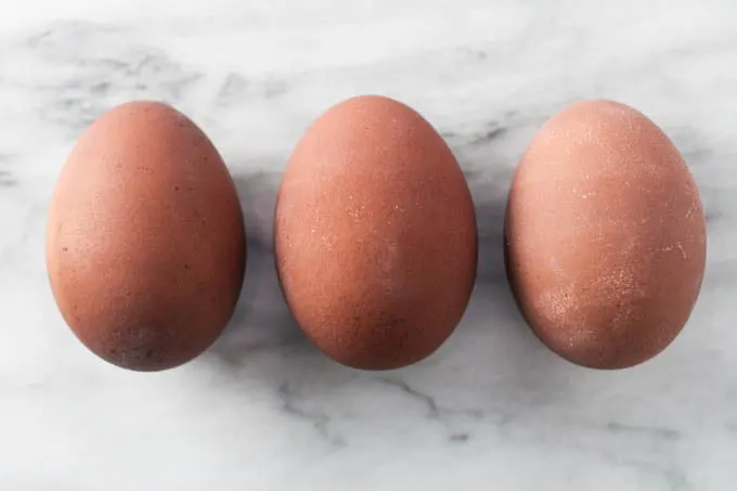 Three taupe Easter eggs.