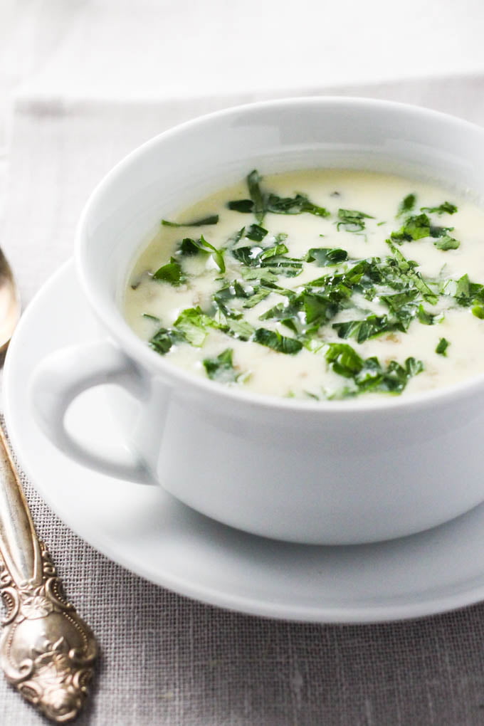 Armenian yogurt soup Spas in a white bowl. Garnished with parsley.