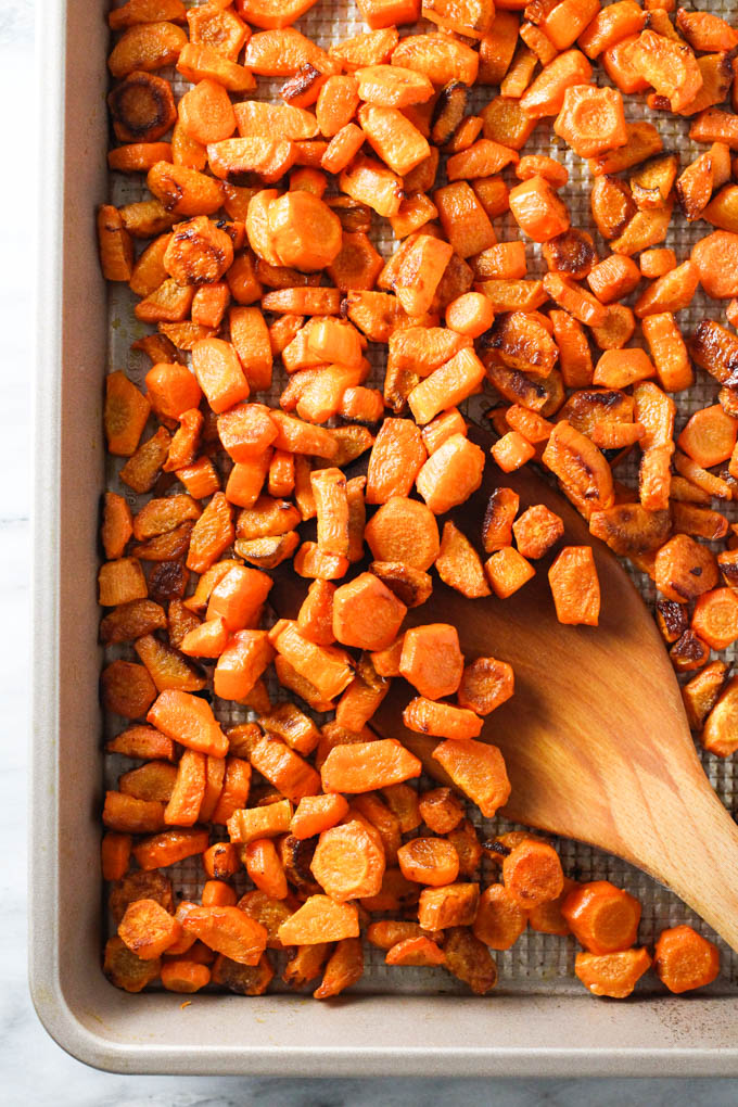 Roasted carrots on a baking sheet.