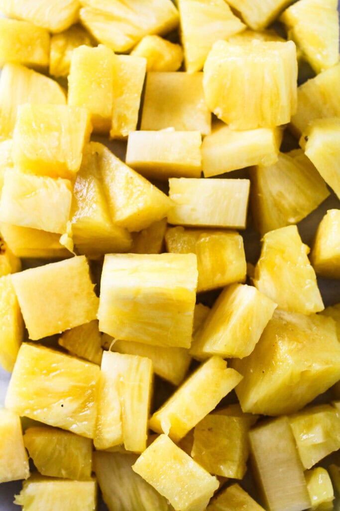 Chopped pineapple pieces ready for blending.