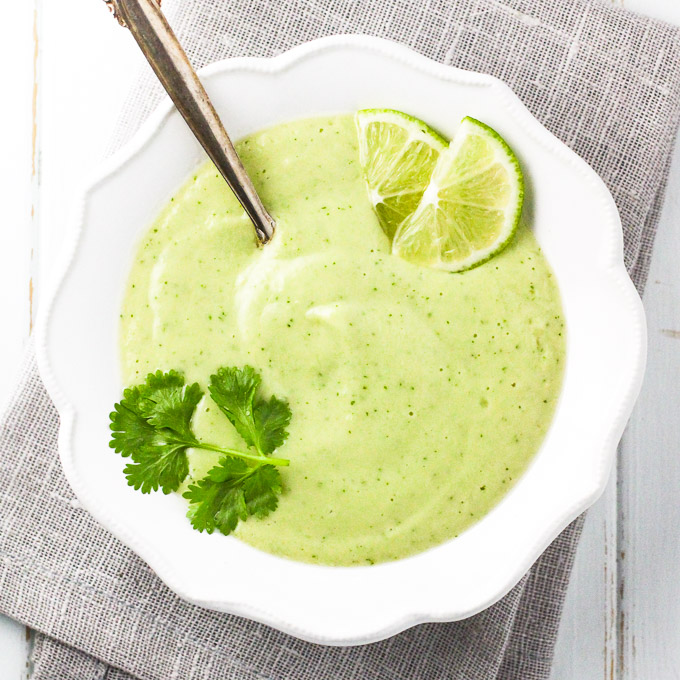 Cold avocado soup in a bowl.