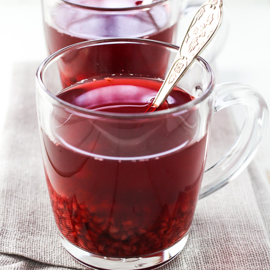 Jasmine green tea in a glass mug.