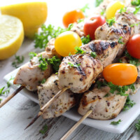 Chicken kebabs on a plate.