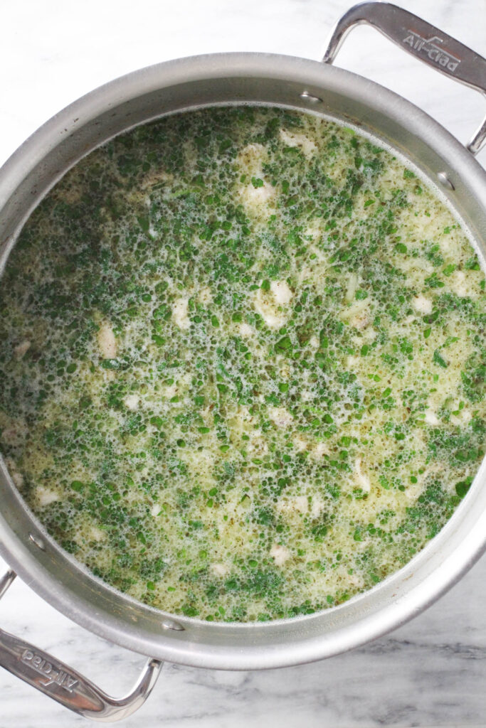 Overhead shot of Chikhirtma in a pot.