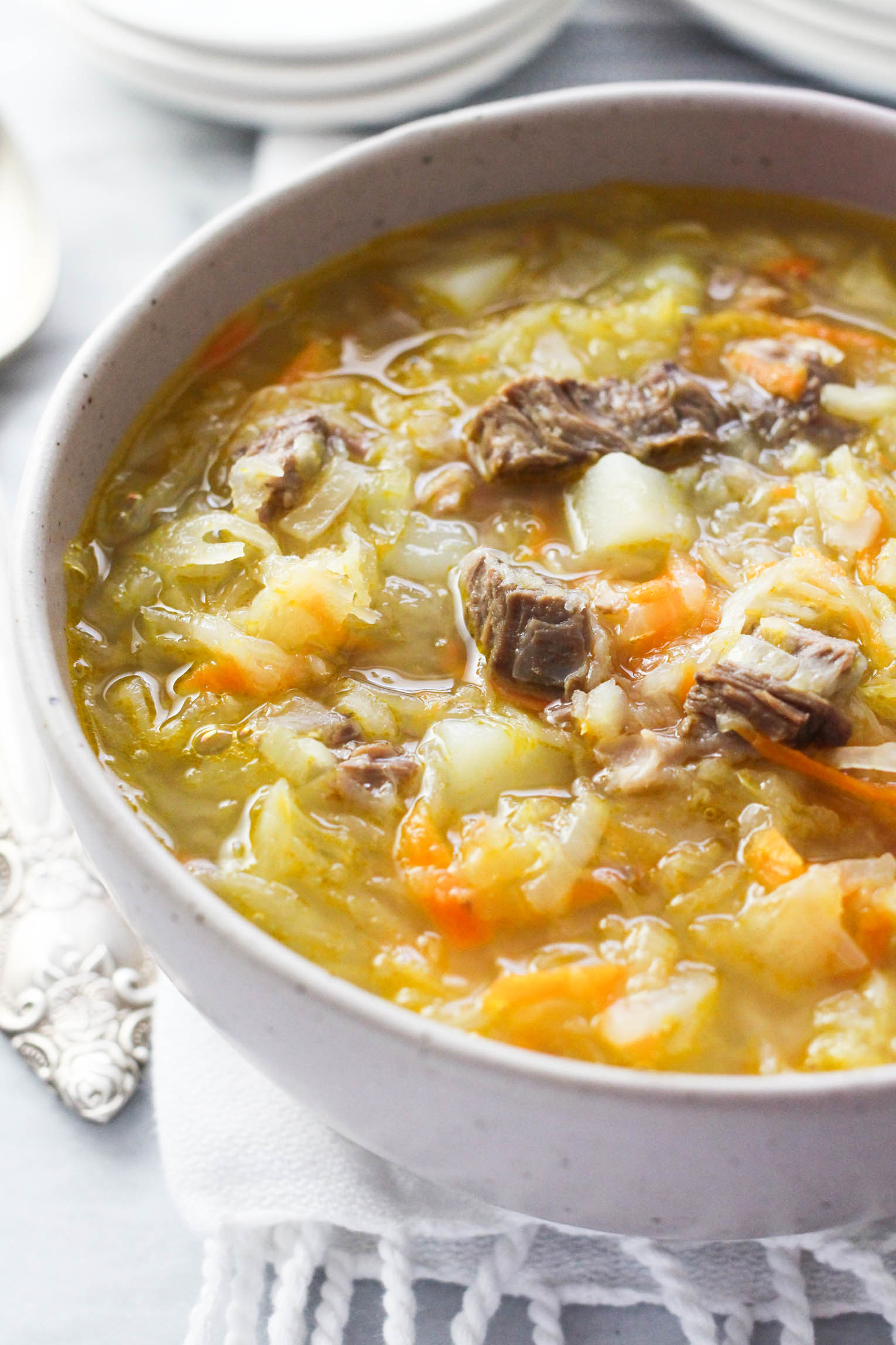 Shchi soup in a bowl.