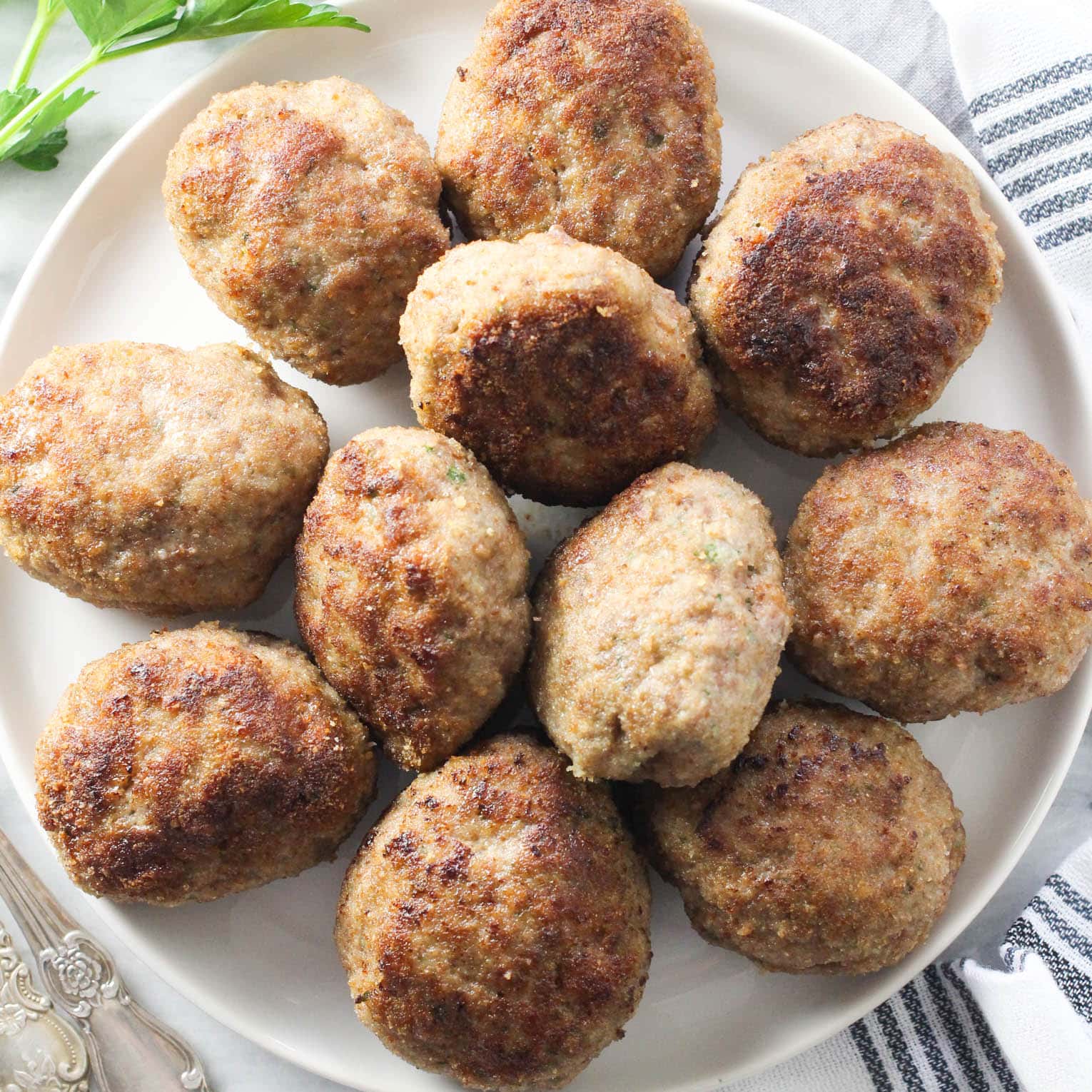 Russian kotlety (meat cutlets) arranged on a platter.
