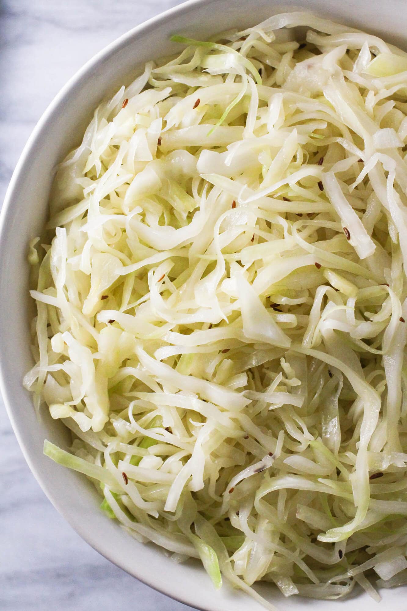 Traditional German Krautsalat cabbage salad in serving bowl.