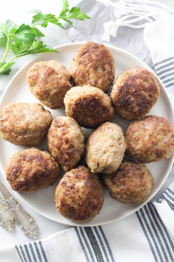 Russian kotlety (meat cutlets) arranged on a platter ready to serve.
